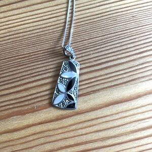 Silver, onyx, and Mother of pearl necklace